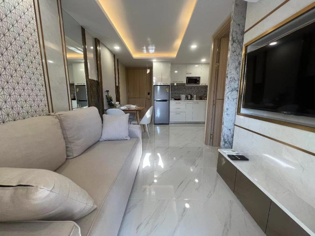 Romantic Beach Apartment芭堤雅水系高档酒店式公寓可做饭 Pantai Jomtien Bagian luar foto