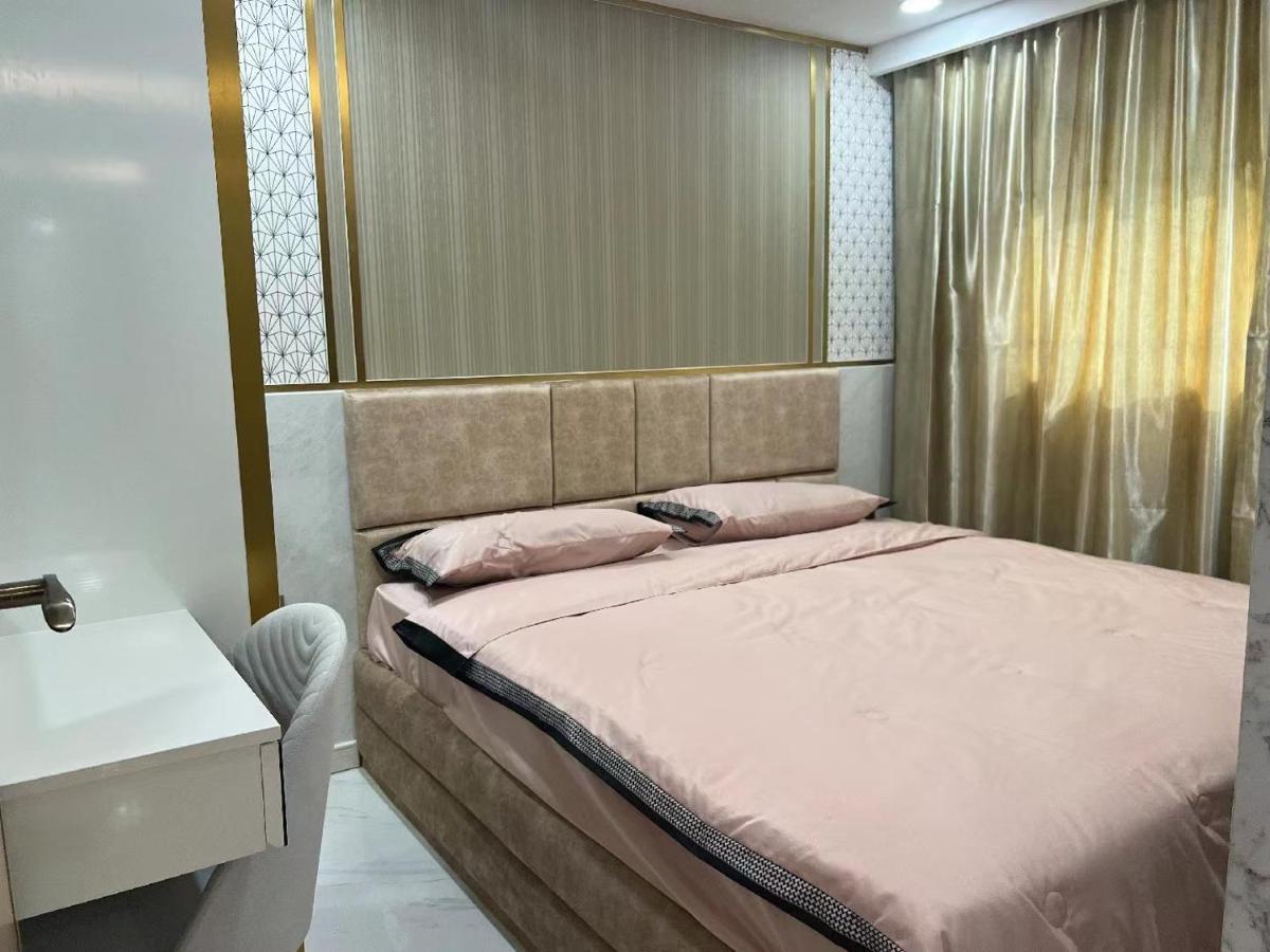 Romantic Beach Apartment芭堤雅水系高档酒店式公寓可做饭 Pantai Jomtien Bagian luar foto