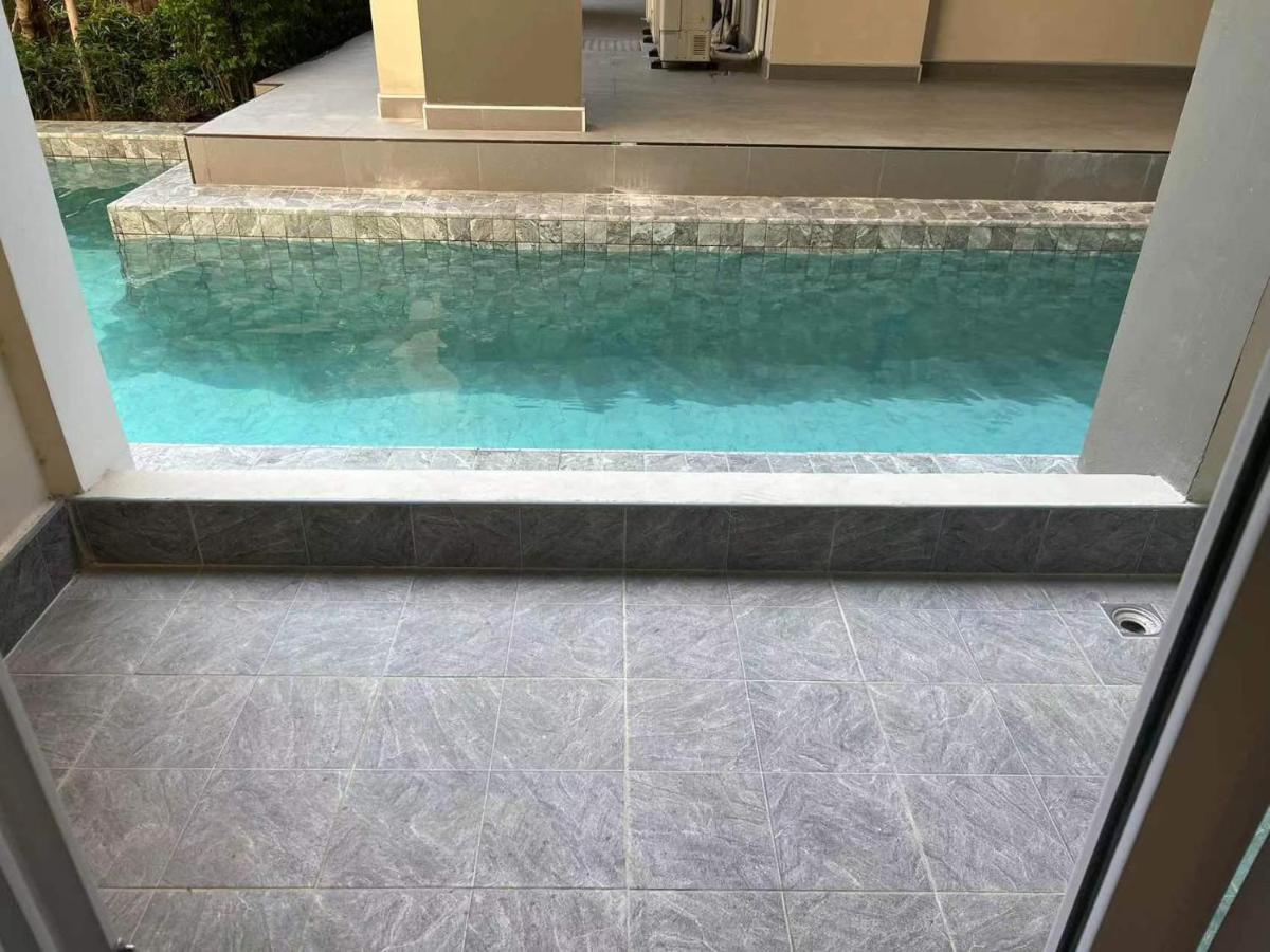 Romantic Beach Apartment芭堤雅水系高档酒店式公寓可做饭 Pantai Jomtien Bagian luar foto