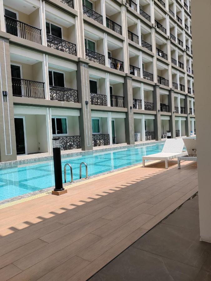 Romantic Beach Apartment芭堤雅水系高档酒店式公寓可做饭 Pantai Jomtien Bagian luar foto