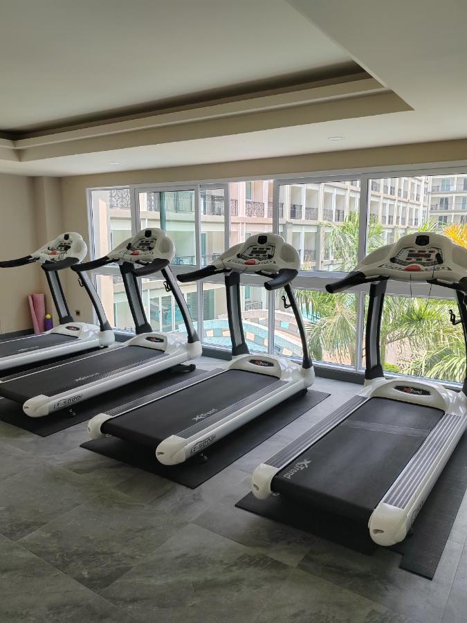 Romantic Beach Apartment芭堤雅水系高档酒店式公寓可做饭 Pantai Jomtien Bagian luar foto